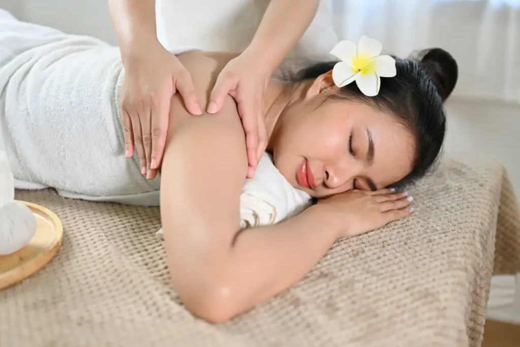 woman receiving best thai body massage at Nexus international spa